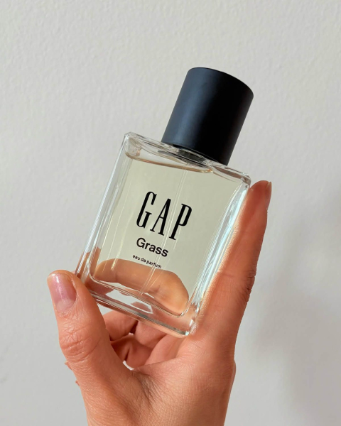allure contributor sable yong holding gap grass in hand